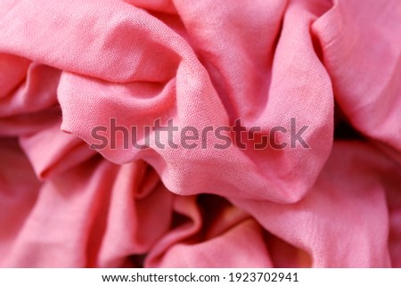 Knitting Wool Texture. Background texture of pattern knitted fabric made of cotton or wool closeup