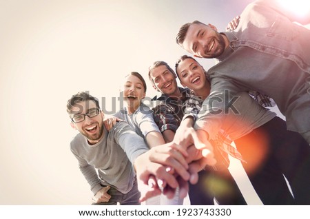 creative team,with hands clasped together Royalty-Free Stock Photo #1923743330