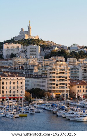 Vieux-Port with Basilique Notre Dame de la Garde on the hill in the background, Marseille, Bouches-du-Rhone, Provence-Alpes-Cote d'Azur, France