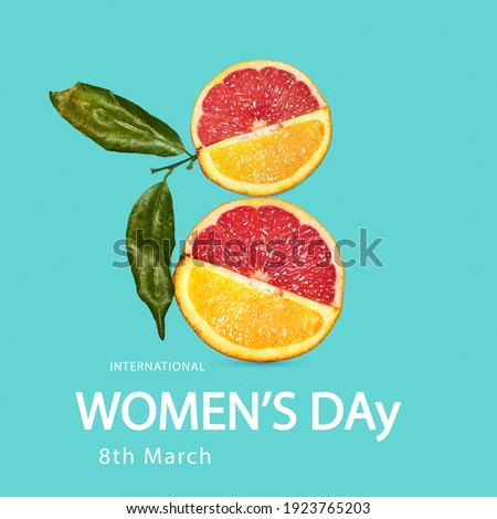 Taste mix. Top view of lemon and orange fruit in shape of number 8 over blue background. Greeting card, postcard for Women's Day March 8th. Concept of holidays, greetings. Copy space for design, ad. Royalty-Free Stock Photo #1923765203