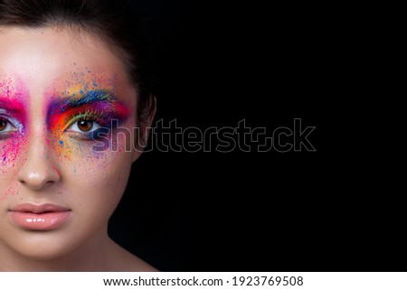 Close up view of face with multicolored makeup Royalty-Free Stock Photo #1923769508