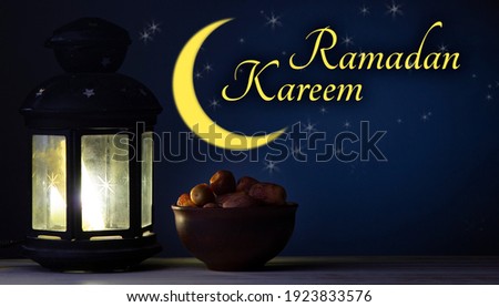 Ramadan Kareem celebration with lanterns and Dried date palm fruits ramazan food