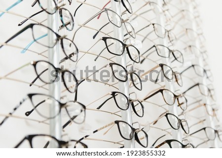 eye glasses on the shelf Royalty-Free Stock Photo #1923855332
