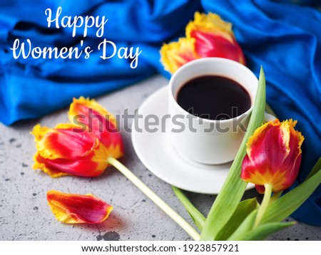 Congratulations on the International Women's Day, a bouquet of tulips, a white cup of coffee , good spring morning