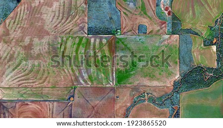  the childhood,  United States, abstract photography of relief drawings in fields in the U.S.A. from the air, Genre: abstract expressionism, abstract expressionist photography, 