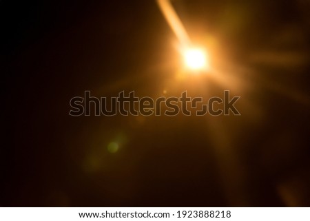 Abstract Natural Sun flare on the black Royalty-Free Stock Photo #1923888218