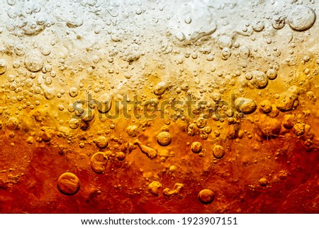 Cola with Ice. Food background ,Cola close-up ,design element. Beer bubbles macro,Ice, Bubble, Backgrounds, Ice Cube, Abstract Background Royalty-Free Stock Photo #1923907151
