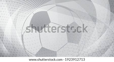 Football or soccer background with big ball in gray colors Royalty-Free Stock Photo #1923912713
