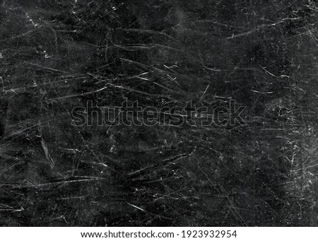 White scratches and dust on black background. Vintage scratched grunge plastic broken screen texture. Scratched glass surface wallpaper. Space for text Royalty-Free Stock Photo #1923932954