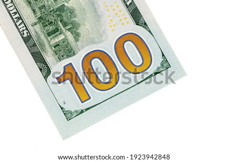 Macro shot closeup of a new 100 dollar. Big 100 sign on back side.