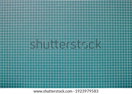 A studio photo of a grid pattern background