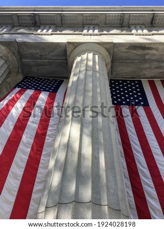 Two large American flags hanging in front of General Grant National Memorial aka Grant's Tomb in Morningside Heights, New York City, USA Royalty-Free Stock Photo #1924028198