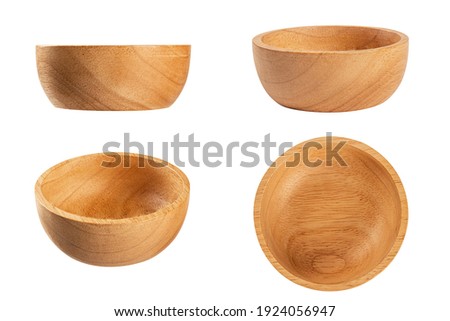 Set of brown wooden bowl isolated on white background. Royalty-Free Stock Photo #1924056947