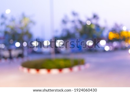 Blurred images in the park with roundabouts at night
