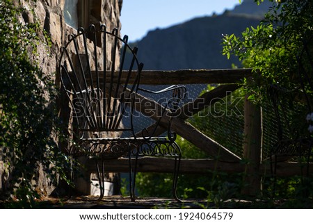 Empty metal chair front an amazing nature view outdoors relax and quietness