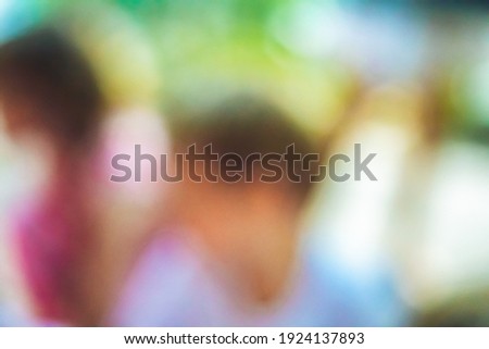 Blur effect photo people child silhouette. Pink white green blue tones for abstract design image background web screensaver cover. Uncertainty, secrecy, extinction, disappearance mood concept