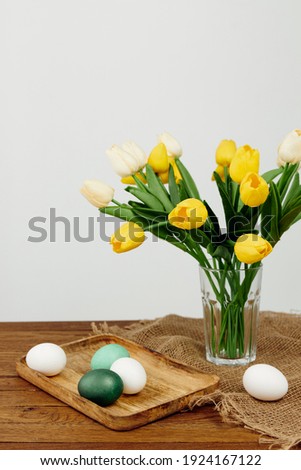 bouquet of spring flowers Easter holiday painted eggs decoration