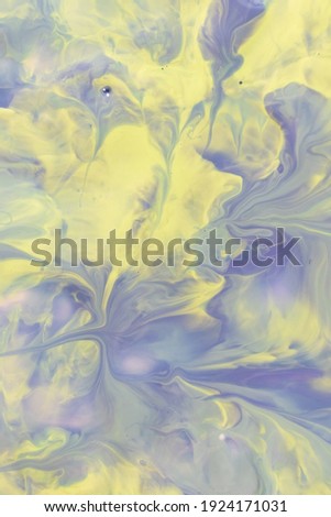 Marble gradient in shades of yellow and lilac-blue, abstract background of mixed colors