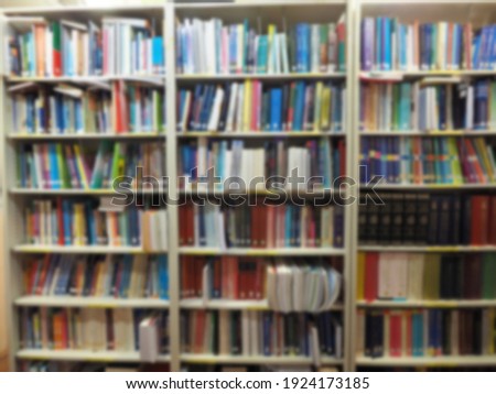 blurred of books cabinet library in school 