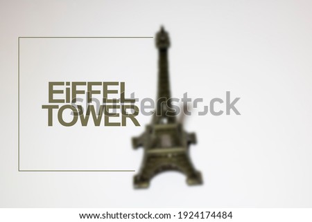 Eiffel Tower blurred unfocused background. Eiffel Tower write.