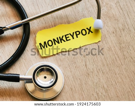 Phrase MONKEYPOX written on strip paper with stethoscope. Medical and health concept. Royalty-Free Stock Photo #1924175603