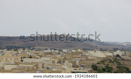 Panoramic view Nadur city and surroundings from viewpoint of Rotunda Saint John Baptist Church. Xewkija city. Gozo island. Malta.