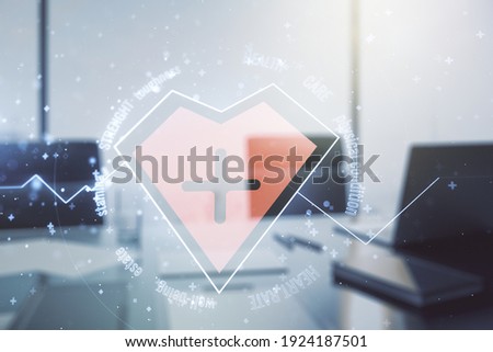 Creative concept of heart pulse illustration and modern desktop with computer on background. Medicine and healthcare concept. Multiexposure