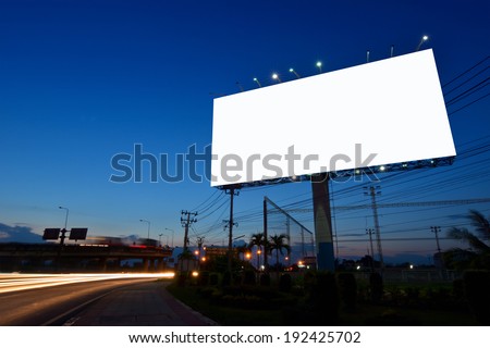 Blank billboard for advertising at twilight Royalty-Free Stock Photo #192425702