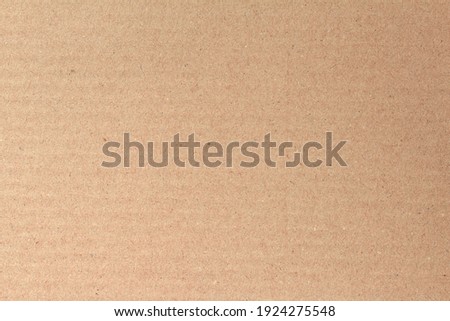 Cardboard sheet texture background, detail of recycle brown paper box pattern. Royalty-Free Stock Photo #1924275548