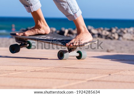 female skate board close up summer time