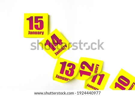 January 15th. Day 15 of month, Calendar date. Many yellow sheet of the calendar. Winter month, day of the year concept