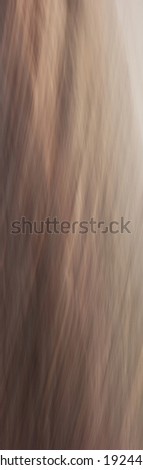 Flowing brown vertical background. Intentional movement image of the beach.