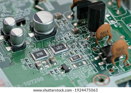 Fragment of electronic microcircuit of modern digital equipment close-up macro photography