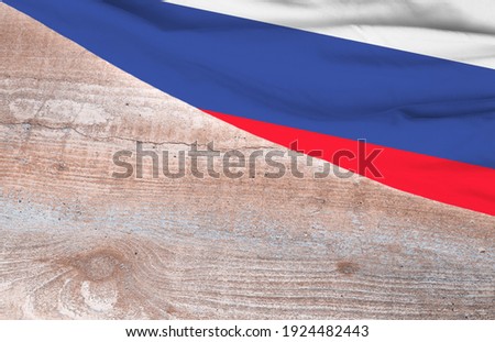 Flag Russia and space for text on a wooden background