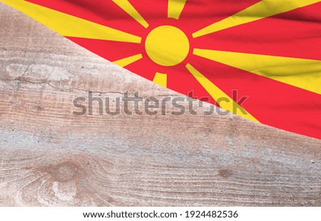 Flag Macedonia and space for text on a wooden background