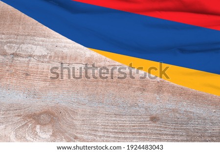 Flag Armenia and space for text on a wooden background