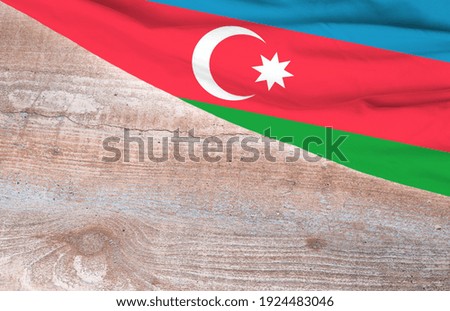 Flag Azerbaijan and space for text on a wooden background