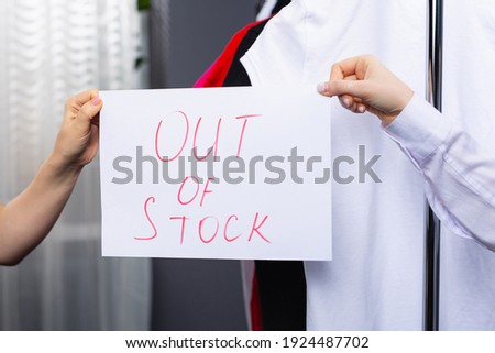 Small business. Out of stock sign of store reopening after lockdown quarantine due to coronavirus pandemic. Open shop activity, support local business, not enough goods, products. High quality photo Royalty-Free Stock Photo #1924487702