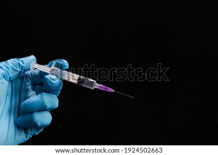 Vaccination banner template. Health care and protection. Medical treatment. Doctor hand holding syringe. Medical gloves hands get rid of medication needle syringe drug, flu and covid concept.