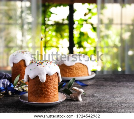 Traditional Easter cakes on grey table indoors. Space for text