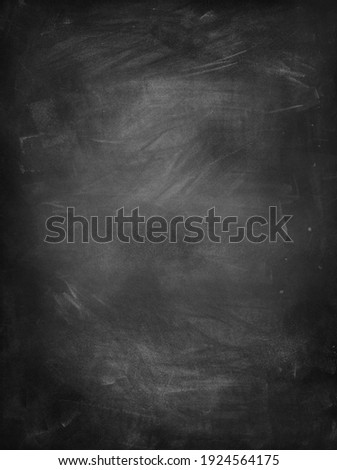 Chalk rubbed out on vertical blackboard background