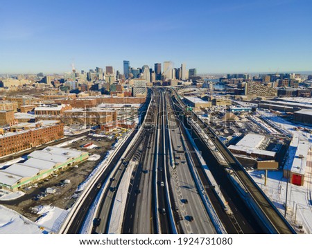 Boston downtown modern city skyline and Interstate Highway 93 in winter aerial view, Boston, Massachusetts MA, USA. 