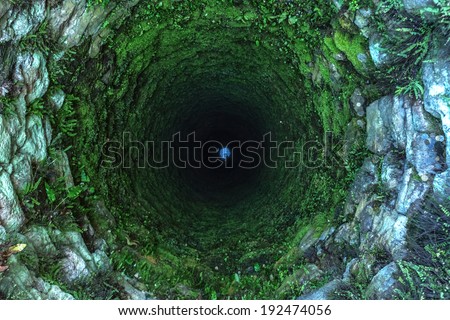 old deep well with moss Royalty-Free Stock Photo #192474056