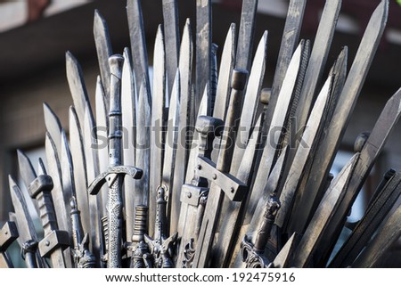 throne made of swords in a medieval fair Royalty-Free Stock Photo #192475916