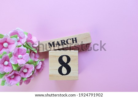 Day 8 of March month, Wooden calendar with date. Empty space for text. Women's day