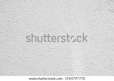 The texture of the white concrete wall for the background