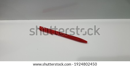 the red pen on white background
