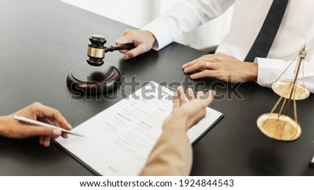Lawyer businessman working with consult. Legal law Judge Gavel Scale of Justice concept.
