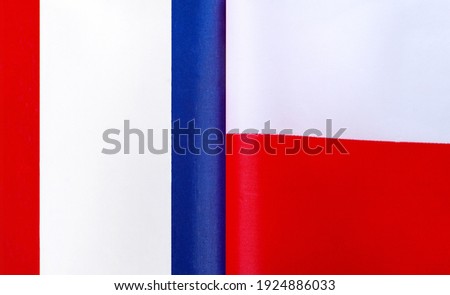fragments of the national flags of France and Poland close-up