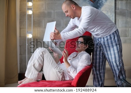 happy young  Couple Using Laptop computer At Home